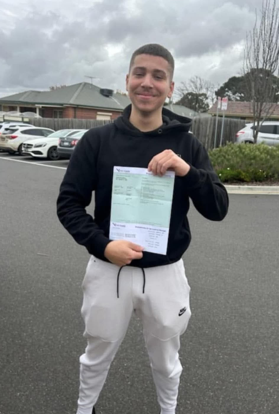 Learner driver celebrating after passing the VicRoads driving test
